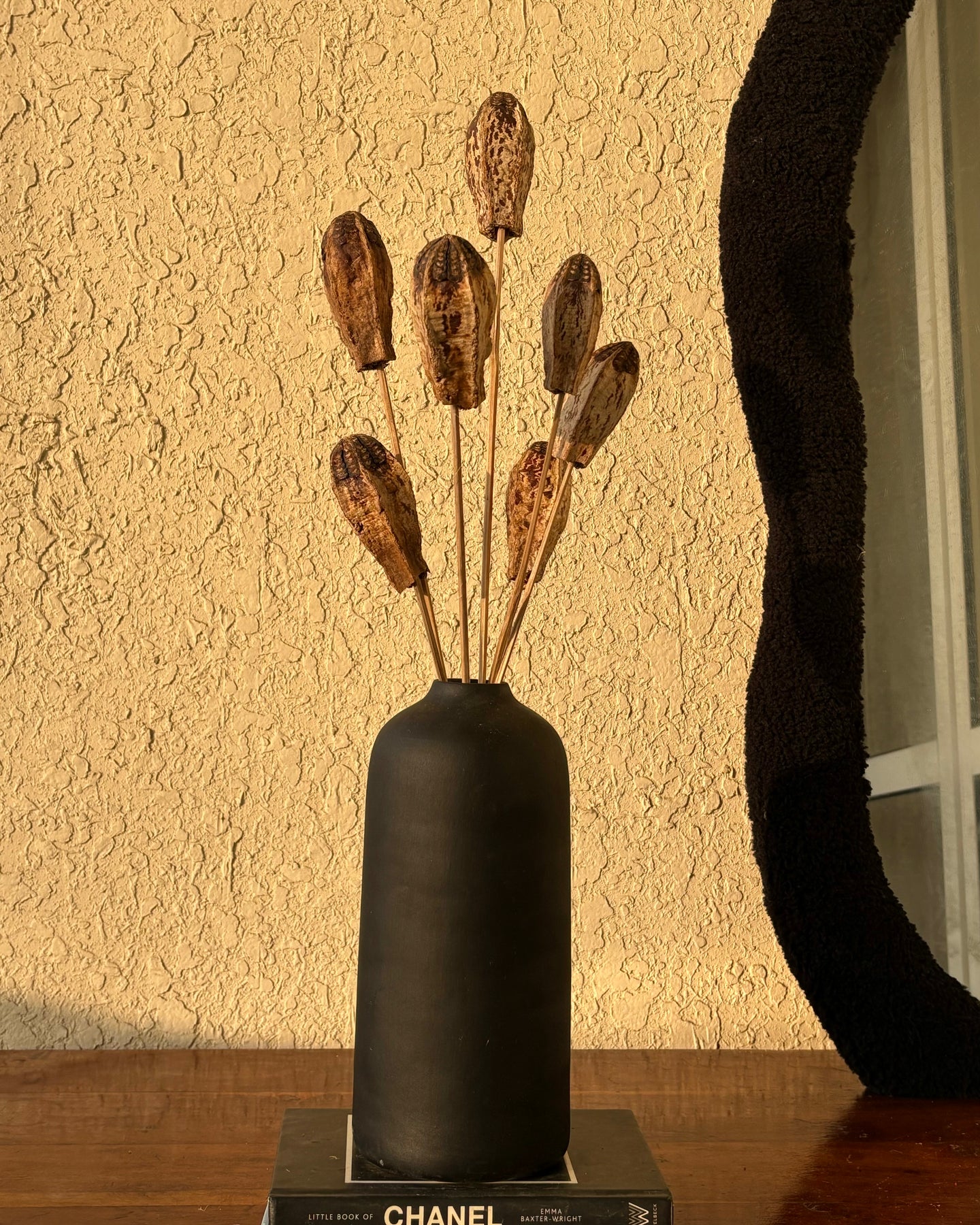 Mahogany stems with vase